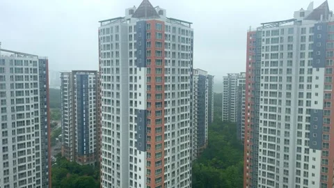 A high-rise apartment complex in white fog Stock Footage 244325462