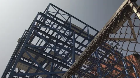 High rise building construction site in city in summer with sound Stock Footage 67204512