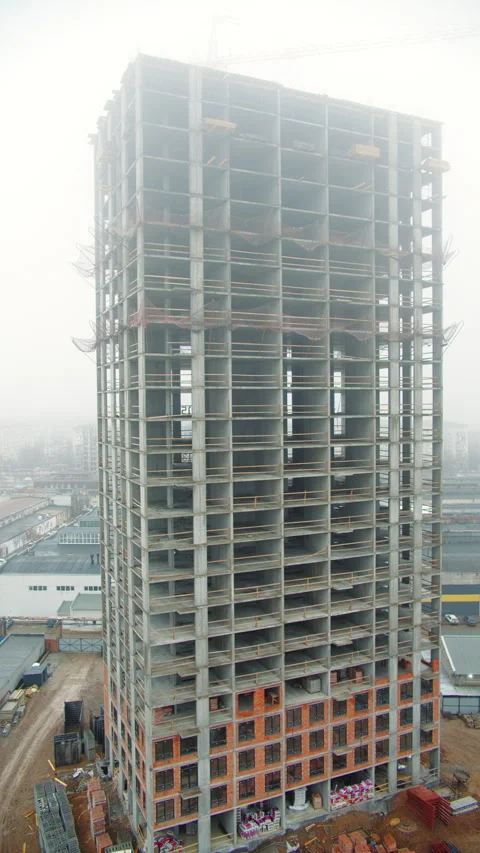 High Rise Building Under Construction with Open Framework Stock Footage 301530472