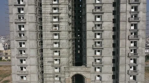 High Rise Building Under Construction Aerial View With Scaffolding Video stock 344268503