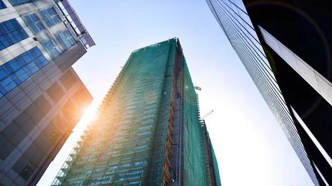 High-rise building under construction. Modern office building. Stock Photos