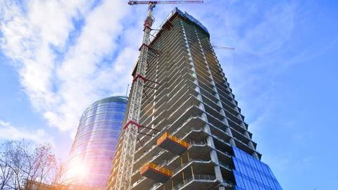 High-rise building under construction. Modern office building. Stock Photos