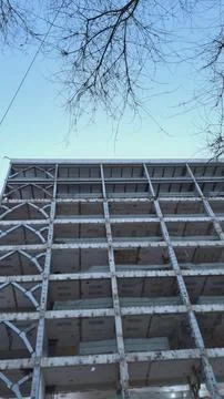 High rise building under construction with steel frame structure. Stock Photos