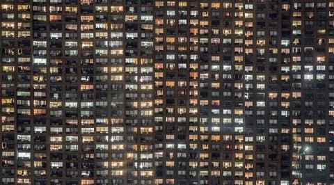 High Rise Building Window Front at Night. Stock Photos
