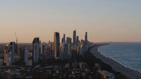 High-rise buildings along the silent sea coast at sunset Stock-Footage 80995938