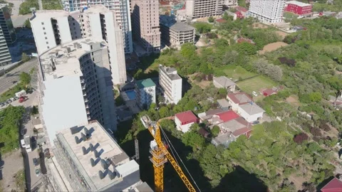 High-rise buildings under construction on a new boulevard in Batumi Stock Footage 164033269