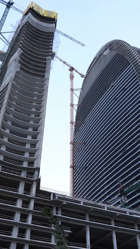 High rise construction with cranes urban development Stock Footage 331023877