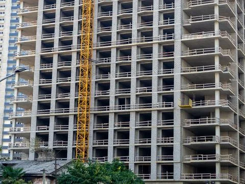 High-rise construction. Skyscraper under construction. Housing frame. Multi-a Stock Photos