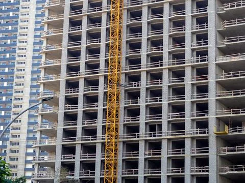 High-rise construction. Skyscraper under construction. Housing frame. Multi-a Stock Photos