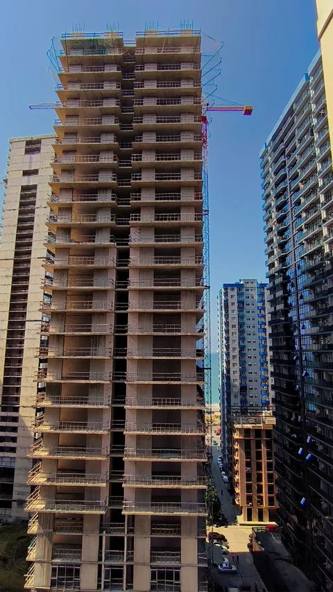 High Rise Skyscraper Building Construction Site Under Blue Sky Stock Footage 342451667