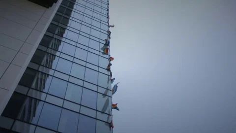 High rise skyscraper flags Stock Footage 98676495