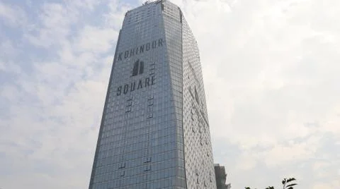 A high rise skyscraper in the main district of metropolis. Stock Photos