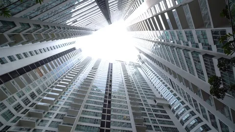 High rising buliding walls inside. 4 walls surround. Tilt down. 4K Stock Footage 93910144