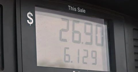 High rising gas prices close up of a gas pump counter Stock Footage 197063476