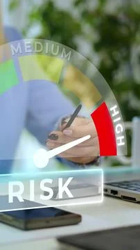 High risk level management, Vertical shot of woman analysing at her office desk Stock Photos