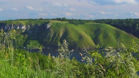 High rock over river at cloudy day, Dniester river, Ukraine Stock-Footage 53368061