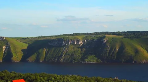 High rock over river at cloudy day Video stock 57466052