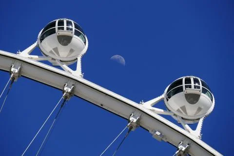 The High Roller and Moon in the Background Photos