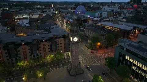 High rotating aerial video of The Albert Clock in Belfast City Centre, Northern Stock Footage 336378579