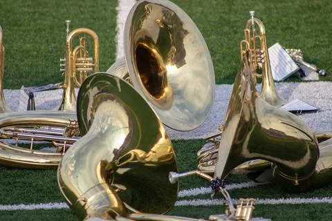 High school band instruments up close on foot ball Stock Photos