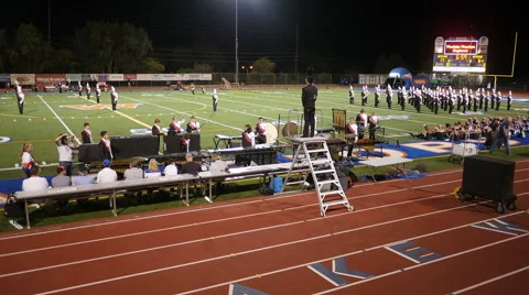 HIGH SCHOOL BAND PERFORMS AT HALF TIME TIME LAPSE HD Video stock 42395839