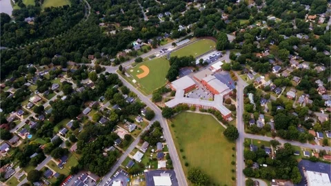 High School, Baseball Field, Track, Football Field, and Homes Stock Footage 140404376