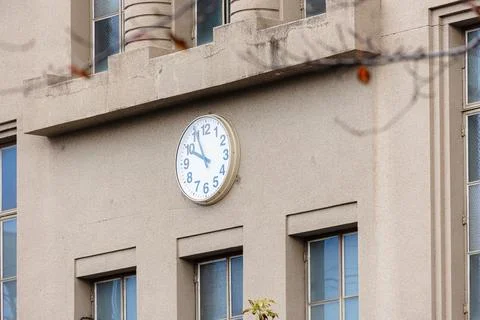 High school facade building with clock at the center in japan traditional s.. Fotos de archivo
