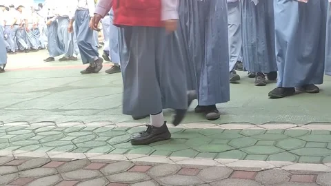 High school girls in Java,  are seen in gray and white uniforms Stock Footage 289707003