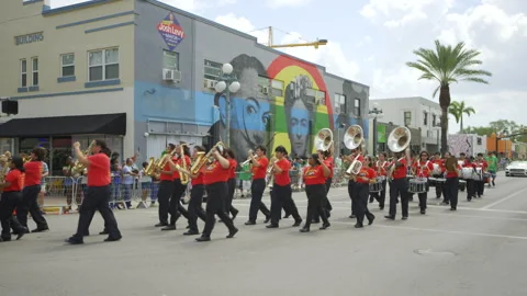High school marching band at the St Patricks Day Parade Hollywood Florida Stock Footage 267689537