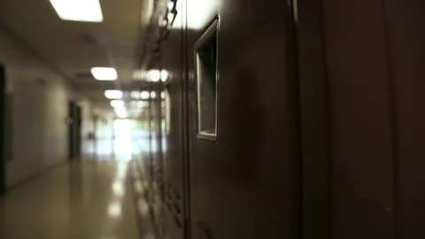 High school or middle school; red lockers; hallway Stock Footage