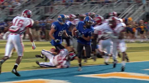 High School Running Back Scores a TD Stock Footage 51698629