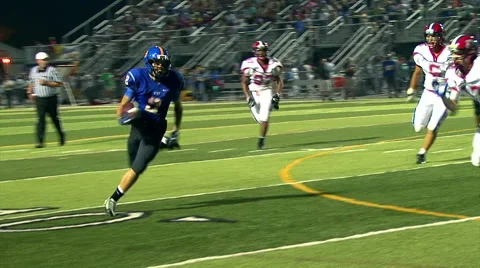 High School Running Back Scores a TD Stock Footage