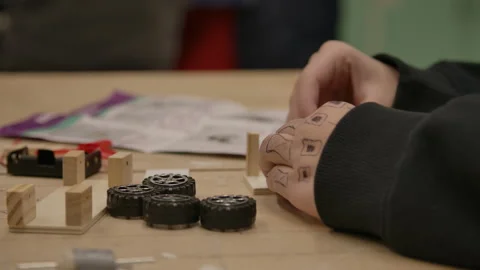 High school STEM class building robot cars Stock Footage 283489554