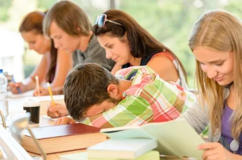 High-school student falling asleep in class teens Stock Photos