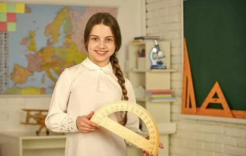 High school student learning geometry in class. measure angles in degrees. Small 스톡 사진