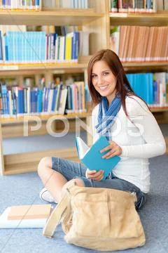 High school student at library read book Stock Photos