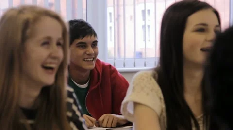 High school student raises hand Video stock 22665327
