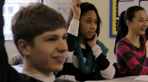 High school student raises hand Stock-Footage 22665330