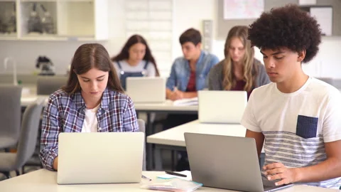 High school student studying on computer in it classroom Stock Footage 145081655