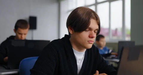 High School Student Working With Computer In Programming Class, Portrait Of Stock Footage 280179675
