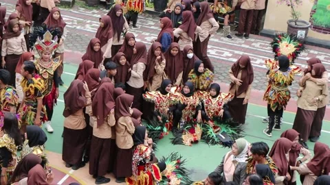 High school students taking a group photo after they performed Video stock 232547330