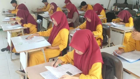 High school students working on assessment questions indoors Stock Footage 269460173