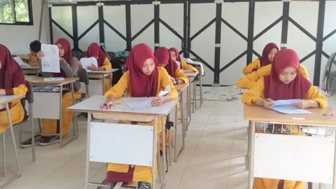 High school students working on assessment questions indoors Stock Footage 269460490