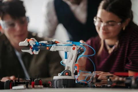 High school students working on robotics project. High schoolers in STEM. Stock Photos