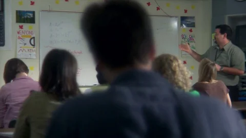 High School Teacher in Front of Class Stock Footage 84354960
