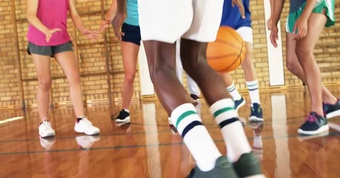 High school team playing basketball Stock Footage