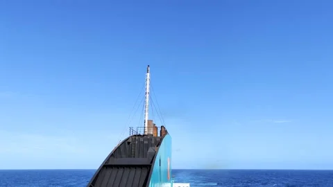High seas view of the stern of a blue ship sailing on a clear day Stock Footage 201464012