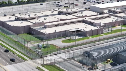 High-security prison complex in America. Multiple buildings and barbed 스톡 동영상 279451746