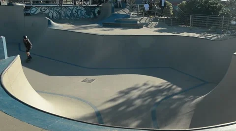 High shot of boy skating on raps in skate park Stock-Footage 59618598