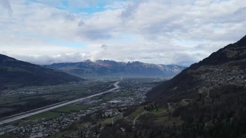 High Shot of River in Valley on Cloudy Day Stock Footage 242807152